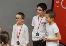 Podium Poussins